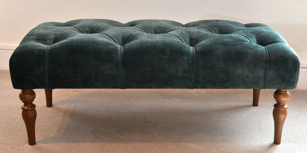 Classic footstool by Delcor in velvet