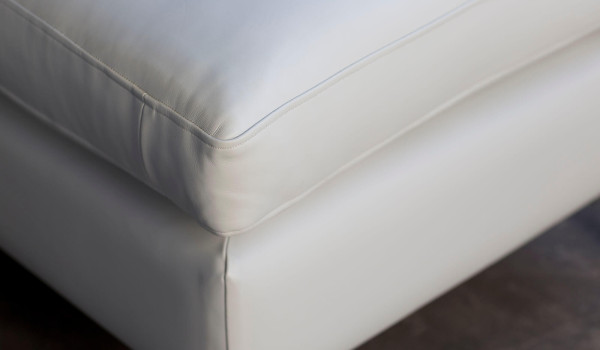 Luxurious-bespoke-Delcor-corner unit sofas-handcrafted in Britain-available in multiple sizes and combinations including chaise. Left facing and right facing options. Extensive fabric selection-over 10,000 options-including plush velvets-fine leathers-diverse patterned or plain fabrics-colour palette including, red, green, black, white, grey blue, purple, yellow, cream and more.