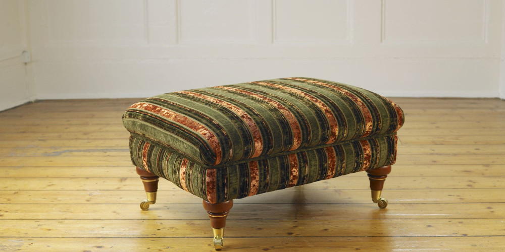 Delcor-bespoke-luxury-footstool-meticulously handcrafted in Britain-choose from over 10,000 fabrics-including velvets-leathers-vast array of patterned and plain materials-available in a broad spectrum of colours-including grey-cream-blue-purple-red-green-and more-each piece showcases timeless design and comfort.