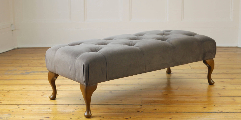 Delcor-bespoke-luxury-footstool-meticulously handcrafted in Britain-choose from over 10,000 fabrics-including velvets-leathers-vast array of patterned and plain materials-available in a broad spectrum of colours-including grey-cream-blue-purple-red-green-and more-each piece showcases timeless design and comfort.