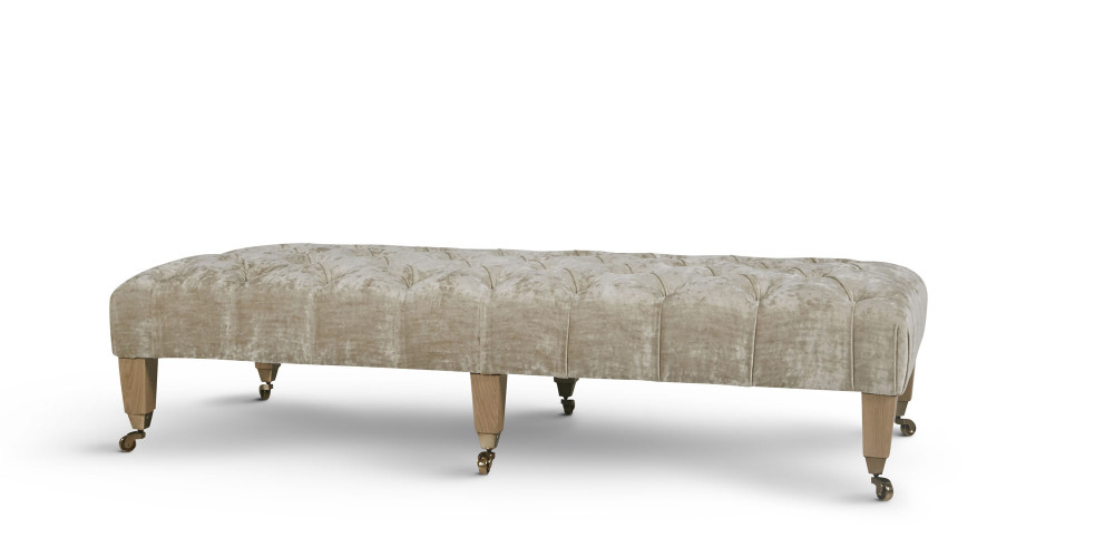 Delcor-bespoke-luxury-footstool-meticulously handcrafted in Britain-choose from over 10,000 fabrics-including velvets-leathers-vast array of patterned and plain materials-available in a broad spectrum of colours-including grey-cream-blue-purple-red-green-and more-each piece showcases timeless design and comfort.