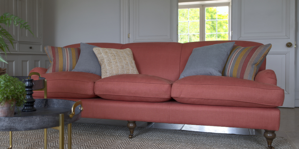 Luxurious-bespoke-Delcor-sofas-handcrafted in Britain-available in two and half seater-three-seater-four- seater. Extensive fabric selection-over 10,000 options-including plush velvets-fine leathers-diverse patterned or plain fabrics-colour palette including, red, green, black, white, grey blue, purple, yellow, cream and more.